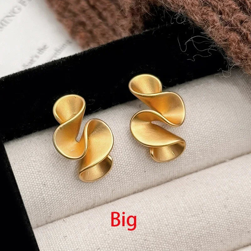 Sterling Silver 18K Gold Twisted Flower Stud Earring