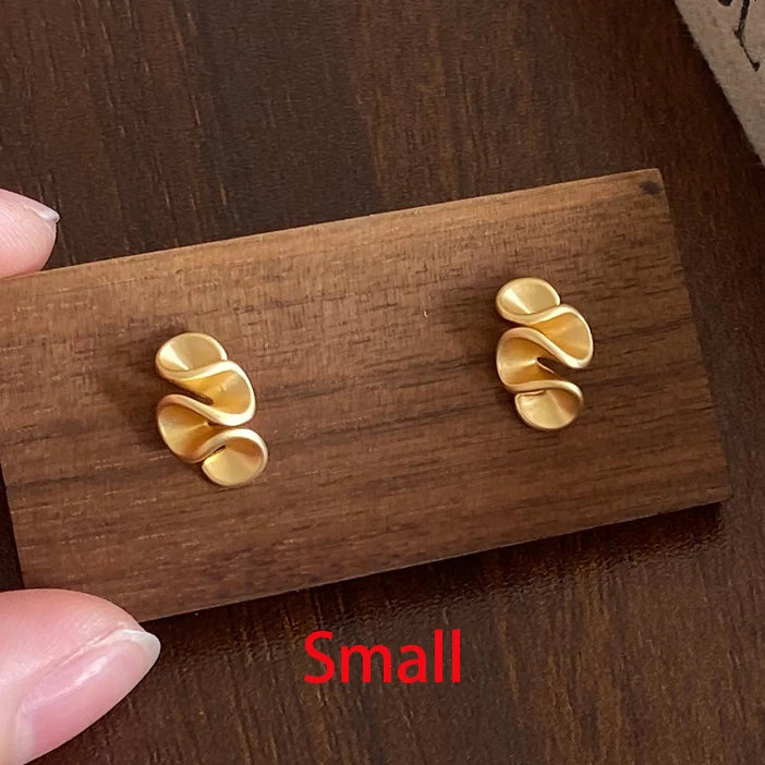 Sterling Silver 18K Gold Twisted Flower Stud Earring